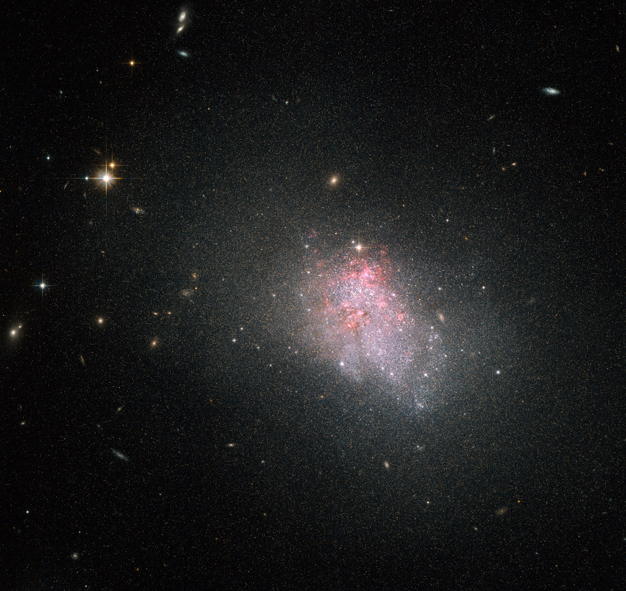 Dwarf Galaxy Churns out New Stars in Hubble Photo